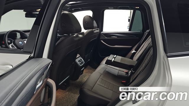 BMW iX3 2024 — photo 18