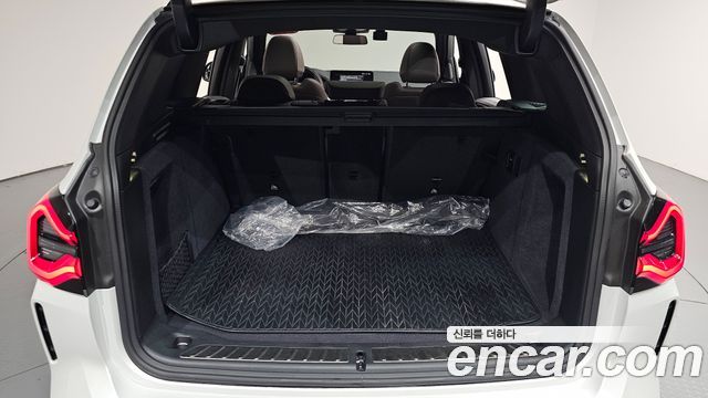 BMW iX3 2024 — photo 26
