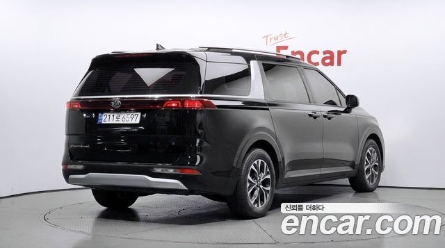 Kia Canival 2021 — photo 2